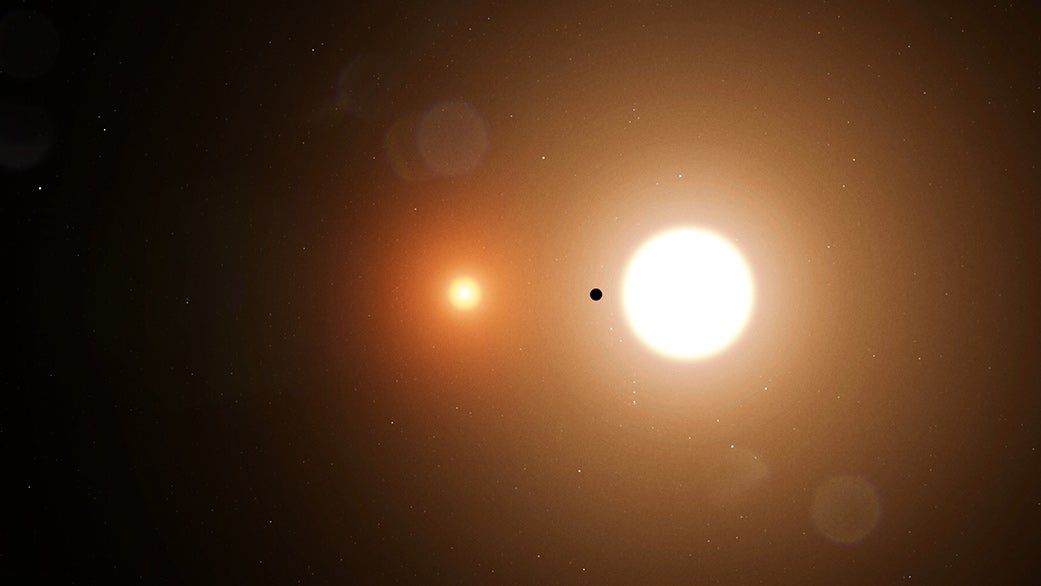 Reproducció artística d'un planeta circumbinari i les seves dues estrelles | NASA