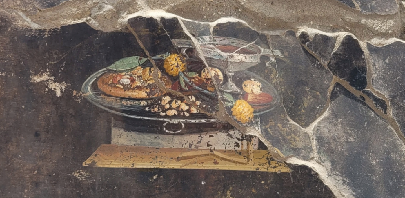 Un mural a les restes d'una casa de Pompeia revela el que sembla clarament una 'focaccia' de fa 2.000 anys | Ministeri de Cultura d'Itàlia